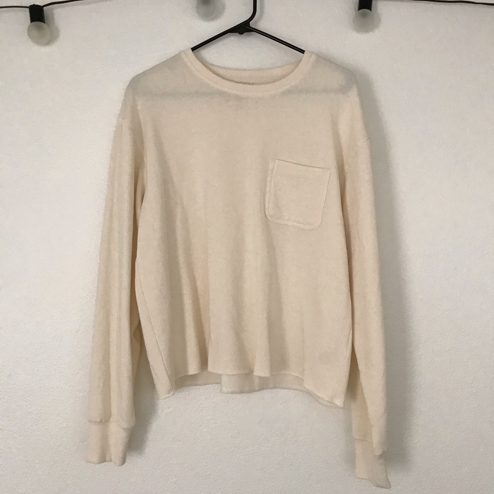 cream colored sweatshirt